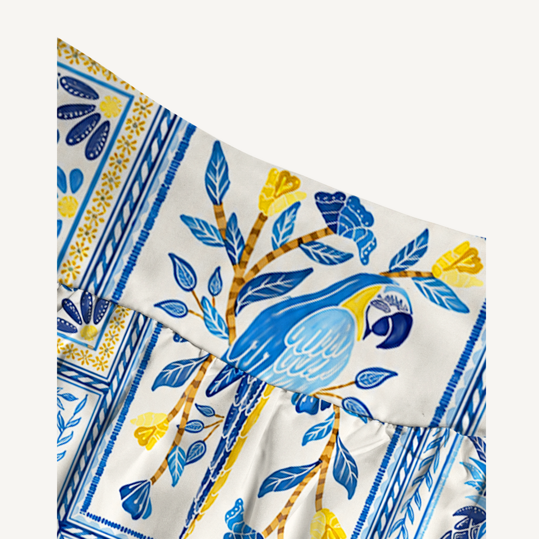 Gonna lunga con motivo a piastrelle tropicali blu e abito senza spalline