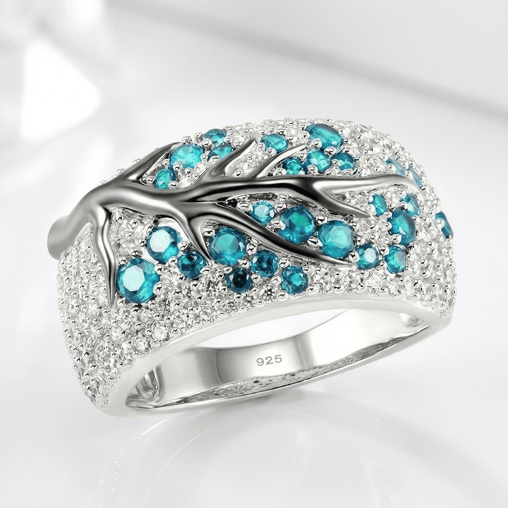 Velaia™ - Anello foglia in argento con topazio blu