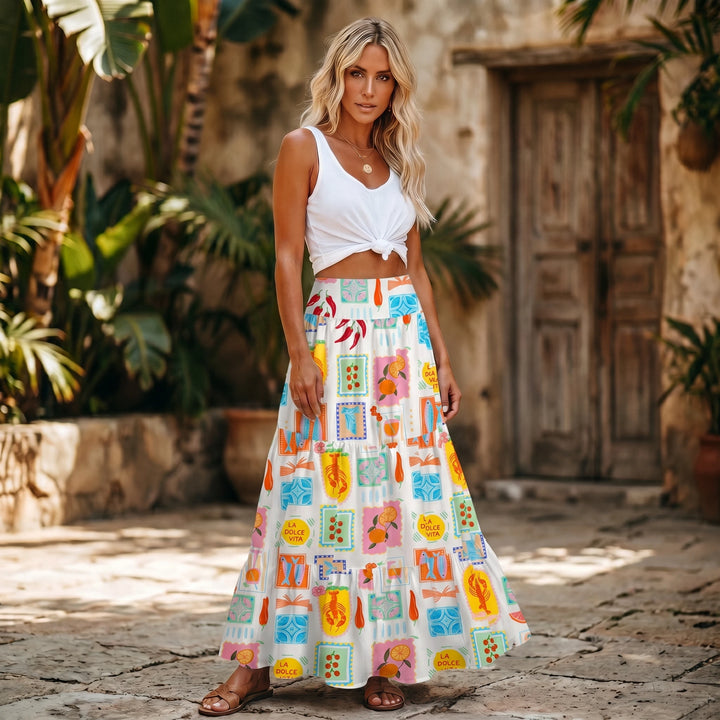 Gonna lunga con stampa tropicale e abito senza spalline