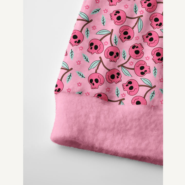 Cardigan lavorato a maglia a tema Halloween con motivo di teschi rosa e fiori