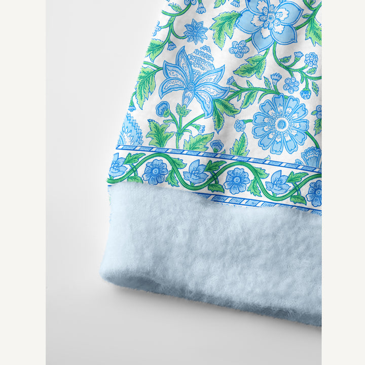 Cardigan lavorato a maglia con bordo decorato con un motivo botanico a vite blu