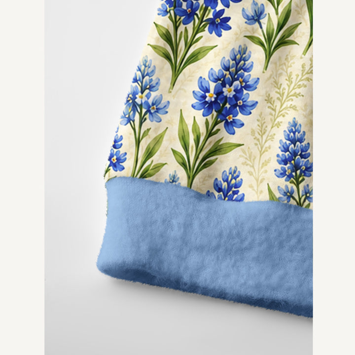 Cardigan lavorato a maglia blu reale con prato di lupini