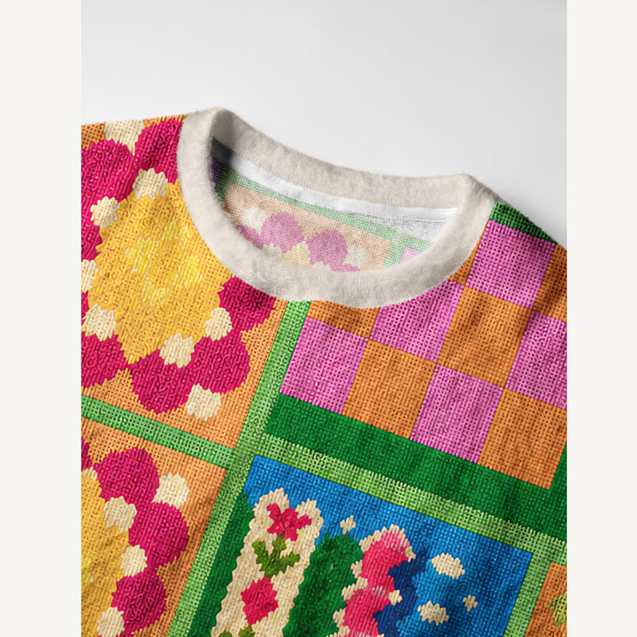 Maglione a girocollo con stampa patchwork geometrica colorata