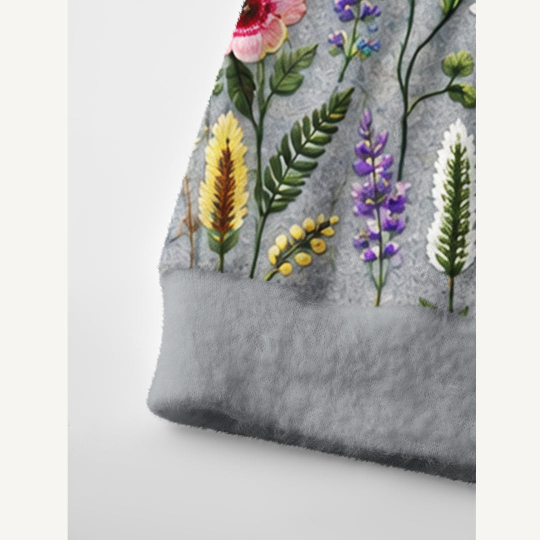 Cardigan lavorato a maglia da giardino di campagna con fiori di campo e farfalle