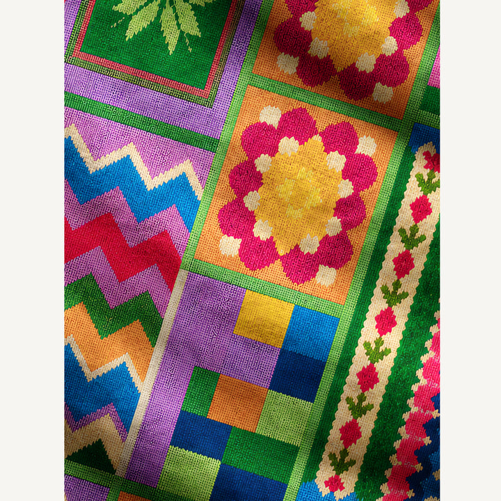 Maglione a girocollo con stampa patchwork geometrica colorata