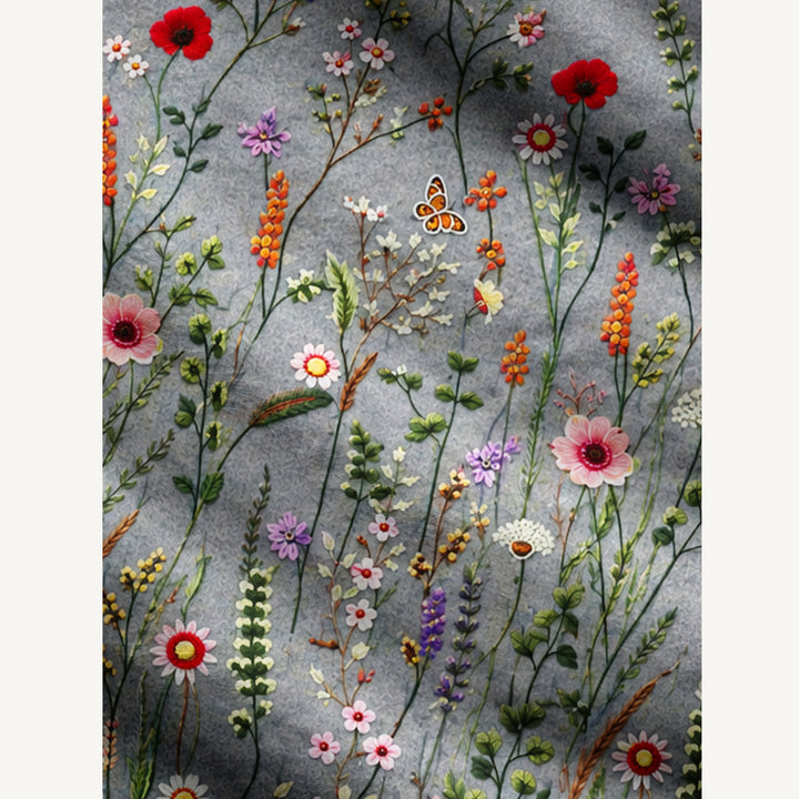 Cardigan lavorato a maglia da giardino di campagna con fiori di campo e farfalle