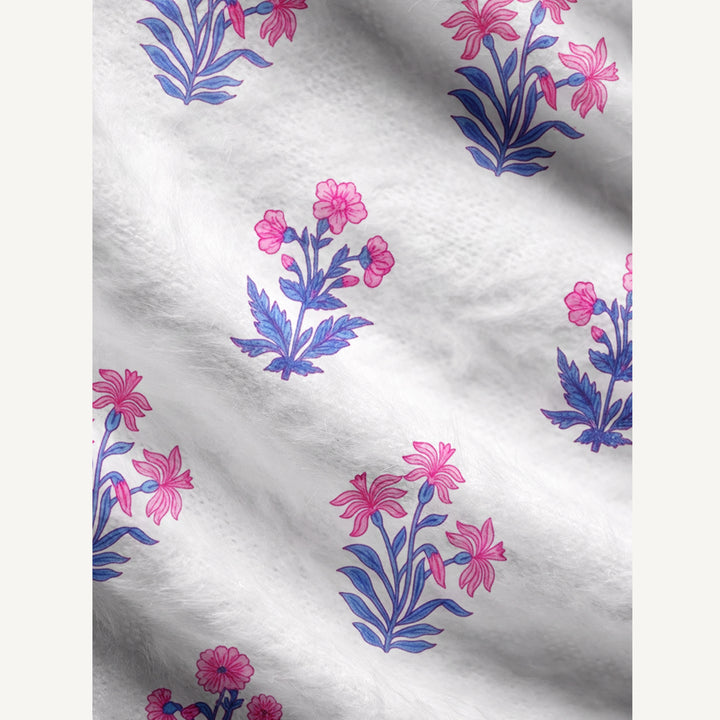 Cardigan lavorato a maglia con motivi botanici in delicate tonalità di rosa e blu