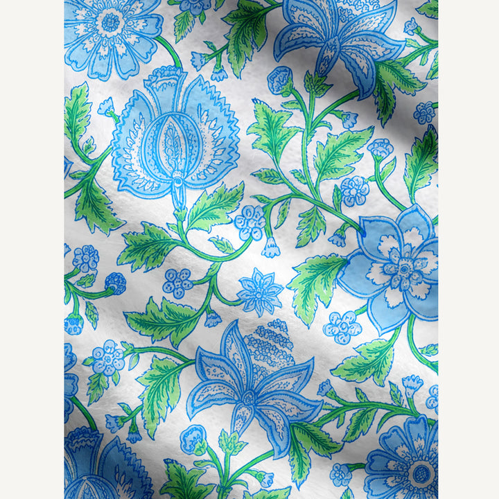 Cardigan lavorato a maglia con bordo decorato con un motivo botanico a vite blu