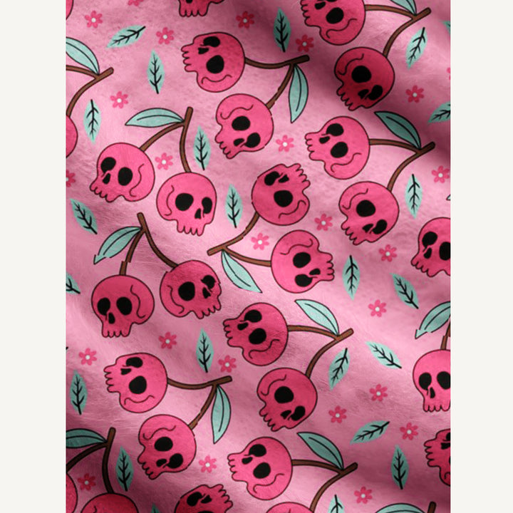 Cardigan lavorato a maglia a tema Halloween con motivo di teschi rosa e fiori