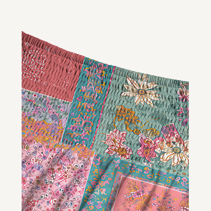 Gonna maxi trasformabile con stampa patchwork “Giardino corallo” e abito senza spalline