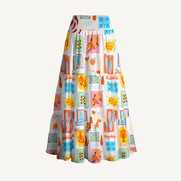 Gonna lunga con stampa tropicale e abito senza spalline
