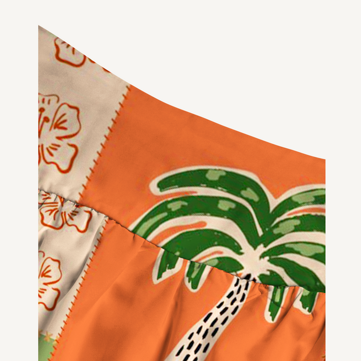 Gonna lunga e abito senza spalline con stampa boho a palme e ibisco