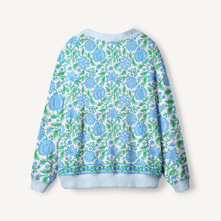 Cardigan lavorato a maglia con bordo decorato con un motivo botanico a vite blu