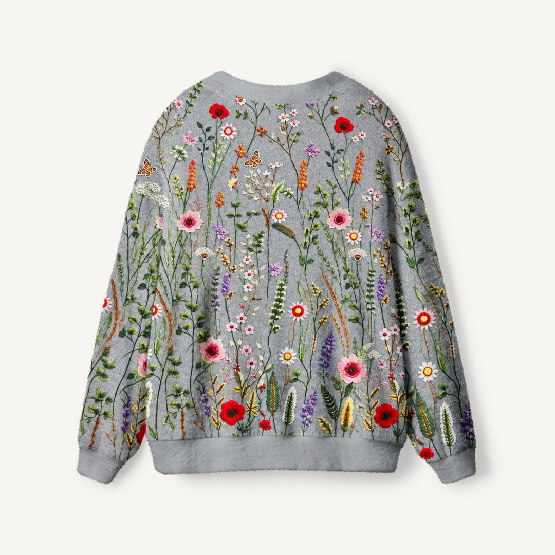 Cardigan lavorato a maglia da giardino di campagna con fiori di campo e farfalle