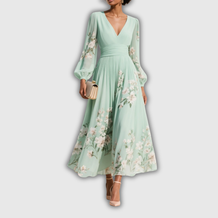 Odelia – Abito Midi Floreale con Silhouette Fluttuante