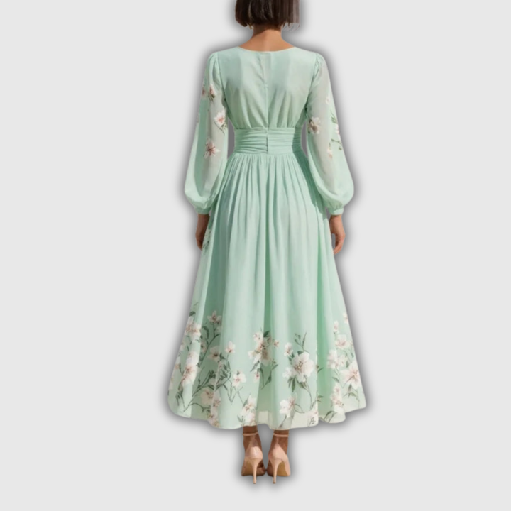 Odelia – Abito Midi Floreale con Silhouette Fluttuante