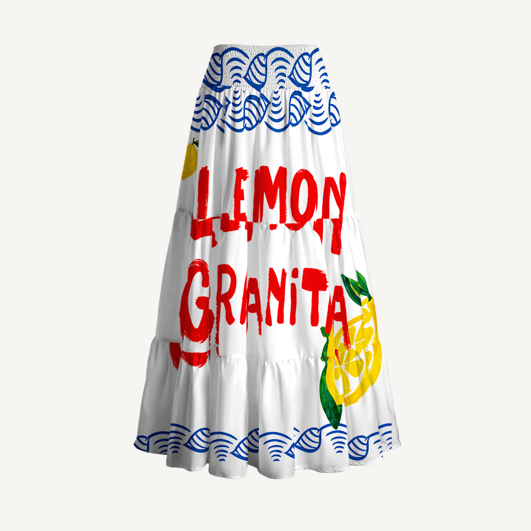 Gonna lunga e abito senza spalline nei colori aragosta e limone