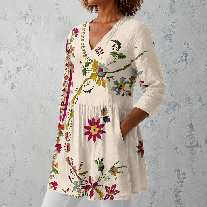 Irene | Blusa lunga in lino con motivo floreale folkloristico e orlo decorato